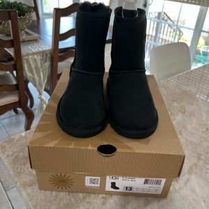 Black Classic UGG Boot is Girl’s Size 13.